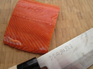 Wild salmon with knife